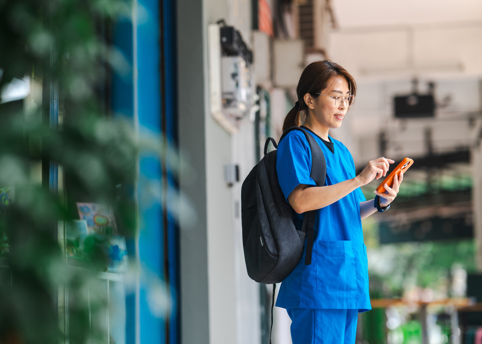 Caregiver using her phone