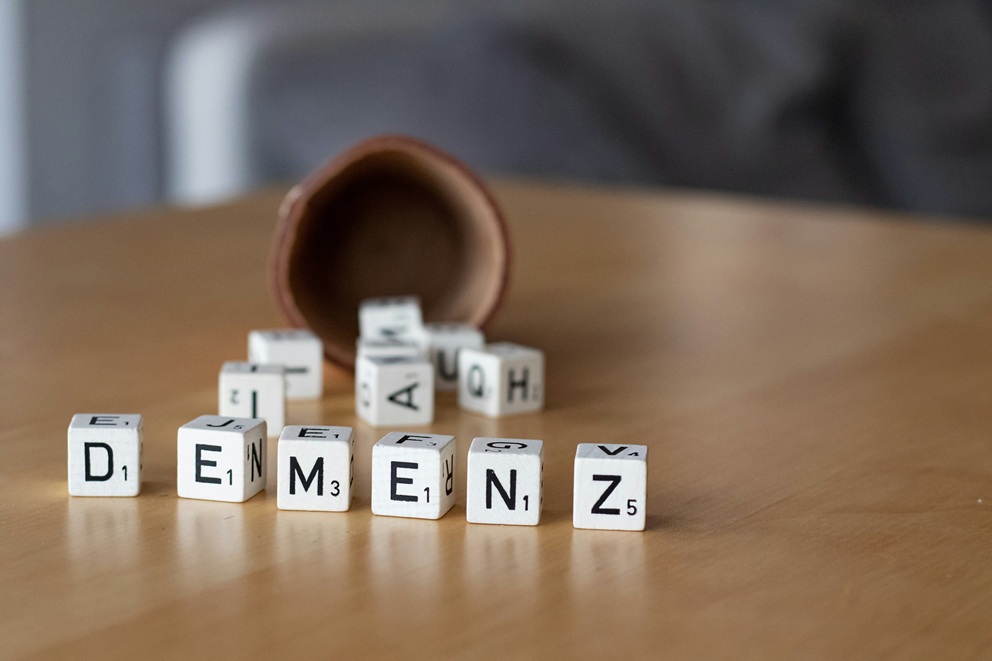 Wooden blocks spelling out DEMENZ