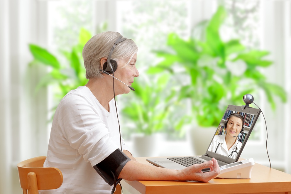 Woman speaking to a doctor over video call